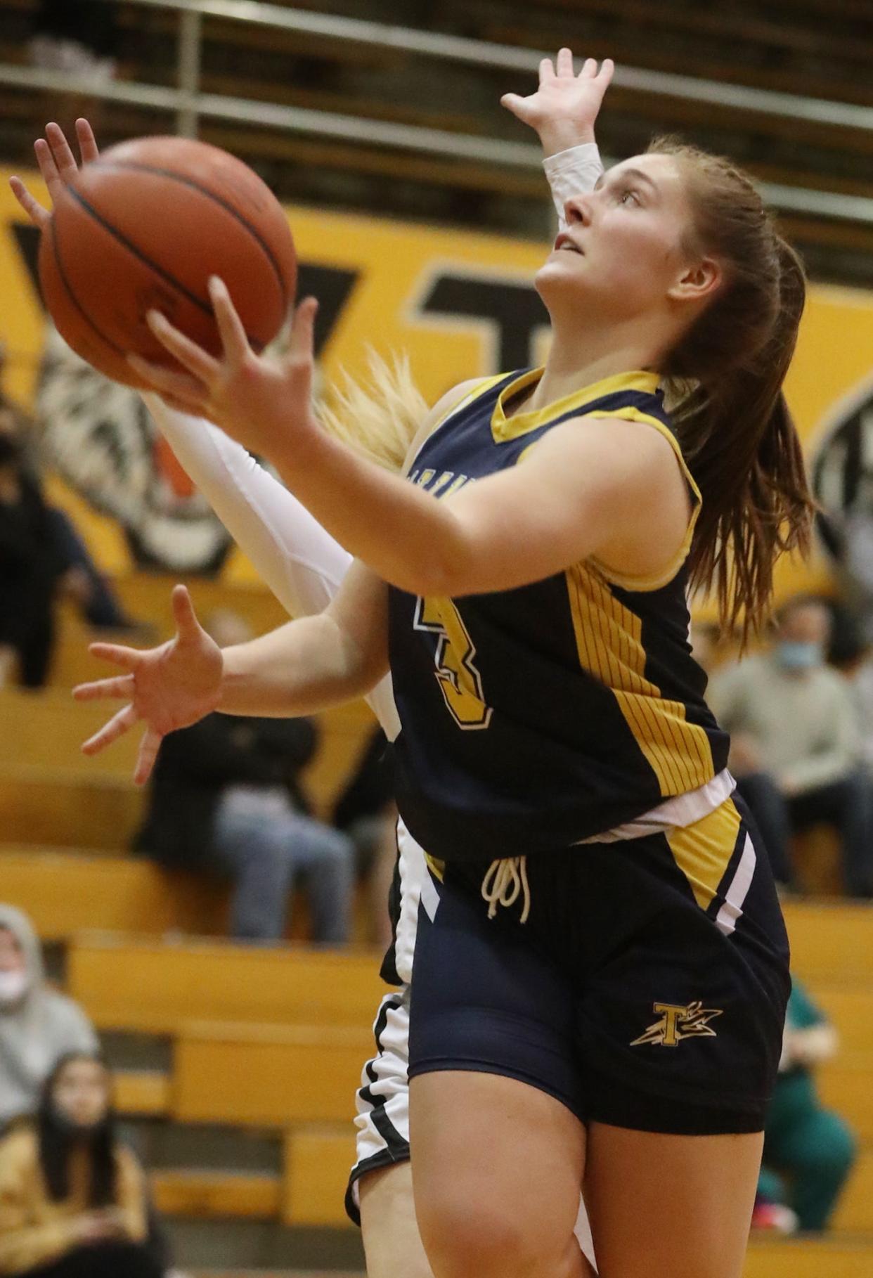 Tallmadge's Maya Dexter shoots against Cuyahoga Falls  during the Suburban League game at Cuyahoga Falls High School.