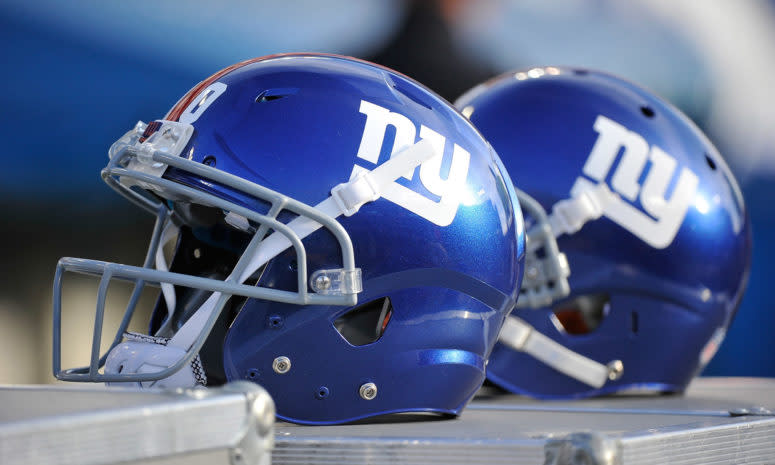 A picture of two New York Giants helmets.