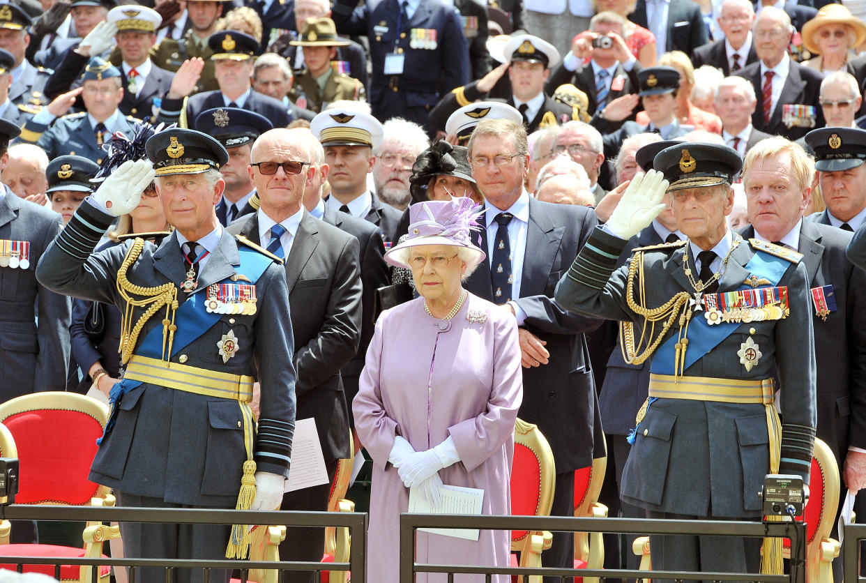 Queen Elizabeth II, the Duke of Edinburgh and Prince of Wales attend the unveiling of the Bomber Command Memorial in Green Park, London. PRESS ASSOCIATION Photo. Picture date: Thursday June 28, 2012. The memorial remembers the sacrifice and bravery of the 55,573 RAF crew who lost their lives in the Second World War. See PA story MEMORIAL Veterans. Photo credit should read: John Stillwell/PA Wire