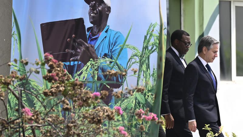 U.S. Secretary of State Antony Blinken, right, and the president of the African Development Bank Group, Akinwumi Adesina, left, during a visit at the AfricaRice Headquarters in Abidjan, Ivory Coast, Tuesday, Jan. 23, 2024. Blinken started the new year with a visit to Africa.