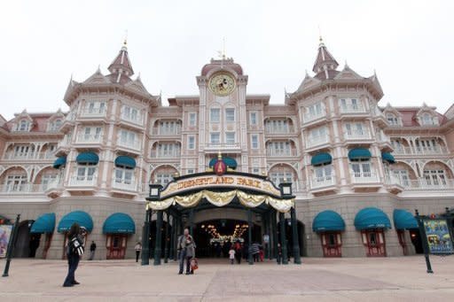 The entrance of the Disneyland park in Chessy, outside Paris, in March 2012. The sprawling park, served by high-speed trains and home to 57 attractions, boasts Big Thunder Mountain and Space Mountain Mission 2, but also lies beneath a debt mountain that amounted to 1.87 billion euros last year