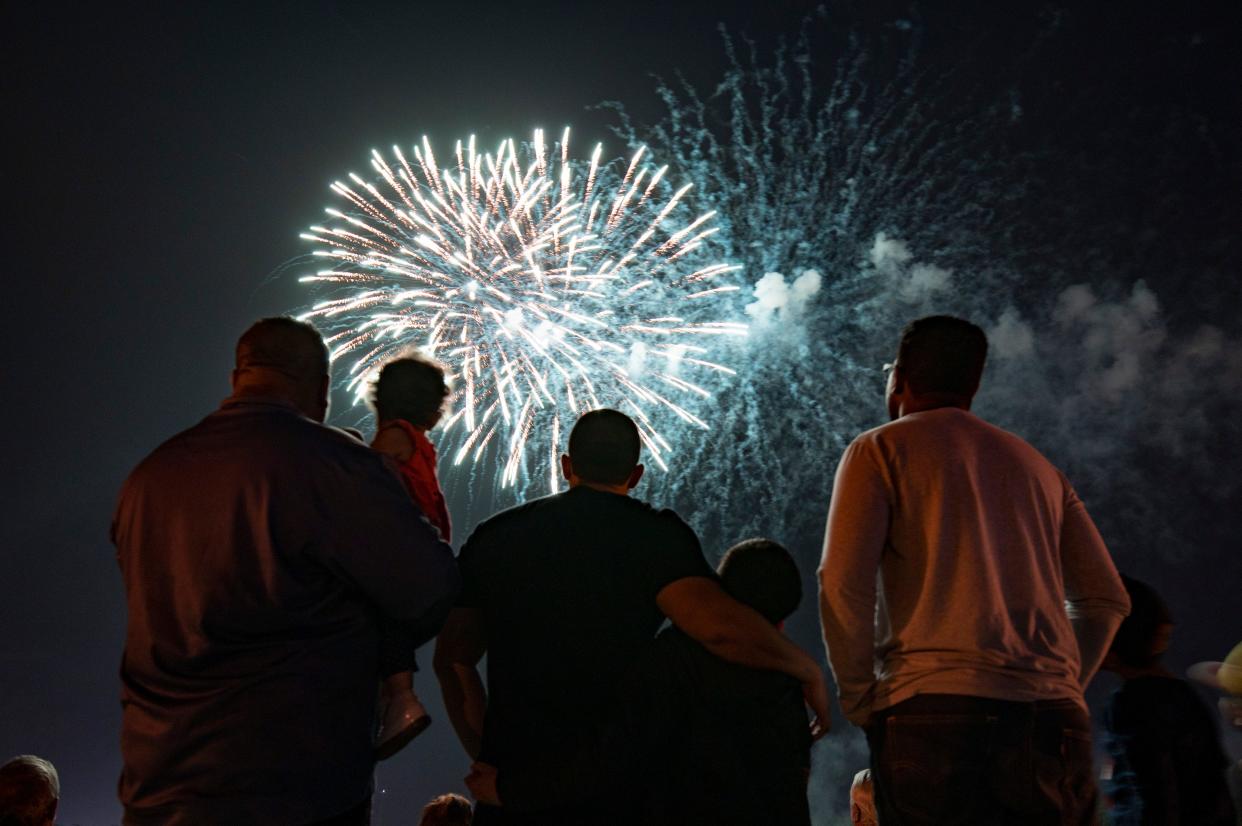 People watch the firework show in Leesburg on Sunday, July 4, 2021. [Cindy Peterson/Correspondent]