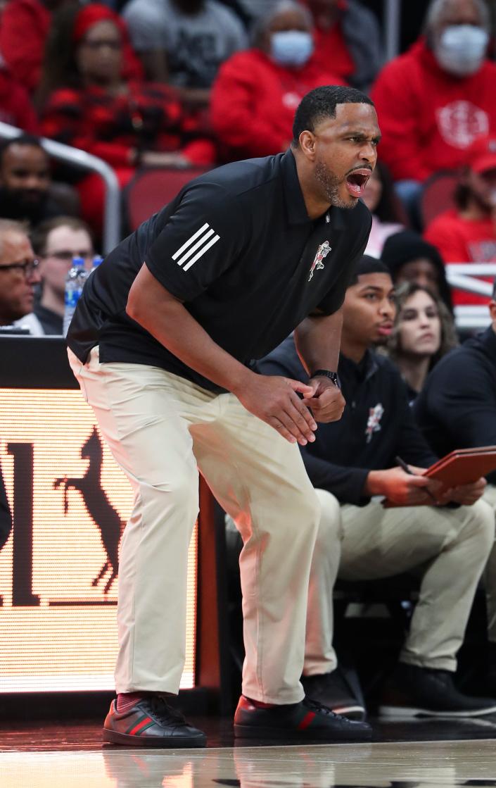 U of L acting head coach Mike Pegues instructs the team against Southern University during their game at the Yum Center in Louisville, Ky. on Nov. 9, 2021.  The university is forcing head coach Chris Mack to sit out 6 games.  U of L won 72-60.