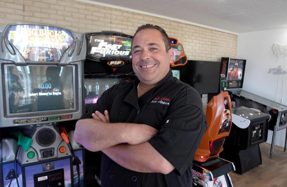 Rib Line and three sister restaurants are a winning combo for SLO County couple who bought a barbecue legacy and ran with it. Brain Appiano stands in the arcade section of the Ribline by the Beach in Grover Beach. Laura Dickinson/ldickinson@thetribunenews.com