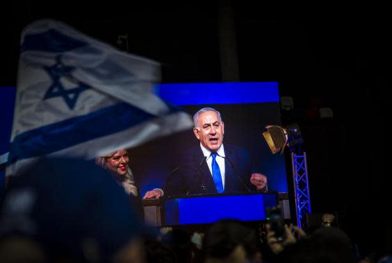 Israel election: Netanyahu and right-wing bloc 'heading for victory' after conflicting exit polls