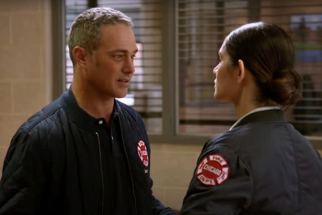 <p>Chicago/YouTube</p> Taylor Kinney and Miranda Rae Mayo on Chicago Fire