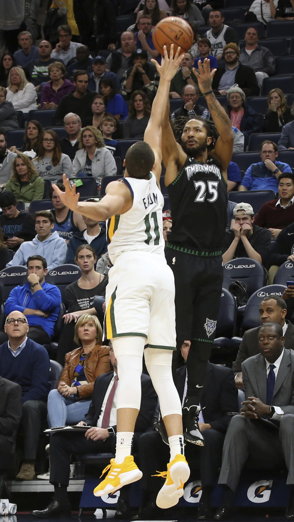 Minnesota Timberwolves' Derrick Rose shoots over Utah Jazz's Dante Exum during the second half of an NBA basketball game Wednesday, Oct. 31, 2018, in Minneapolis. The Timberwolves won 128-125. Rose scored 50 points, a career high. (AP Photo/Jim Mone)