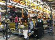 FILE PHOTO: Workers assemble Chevy Bolt EV cars at the General Motors assembly plant in Orion Township