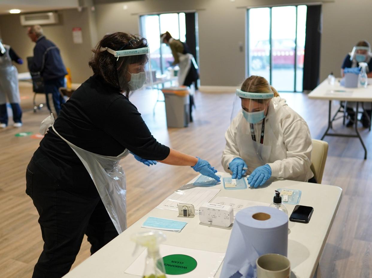  Support practitioners from Redcar and Cleveland Borough Council process lateral flow tests during a community testing pilot scheme on December 15, 2020 (Getty Images)