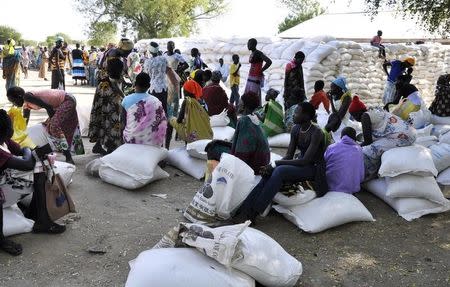 Internally displaced South Sudanese women gather to receive food aid from the World Food Programme in Bor, Jonglei state, in this file photo taken on December 10, 2014. REUTERS/Jok Solomon