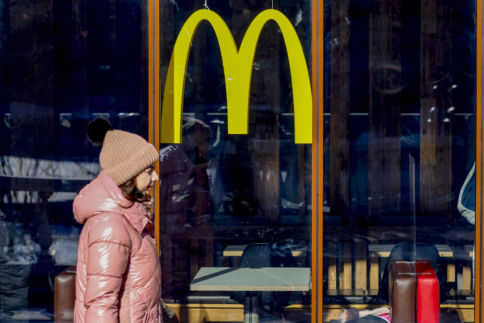 A woman walks past a McDonald's restaurant in Moscow, Russia on March 09, 2022. (Photo by Sefa Karacan/Anadolu Agency via Getty Images)