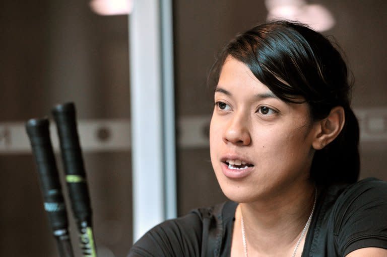 World squash champion Nicol David of Malaysia, pictured during an interview with AFP, in Malaysia's northern state Penang, on April 12, 2012. Record-breaking David extended her haul of World Open titles to seven from eight finals when she overcame Laura Massaro, 11-6, 11-8, 11-6, on Friday, in a match of long and patient rallies