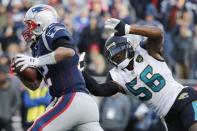 FILE PHOTO: Jan 21, 2018; Foxborough, MA, USA; New England Patriots quarterback Tom Brady (12) runs ahead of Jacksonville Jaguars defensive end Dante Fowler (56) during the first quarter in the AFC Championship Game at Gillette Stadium. David Butler II-USA TODAY Sports