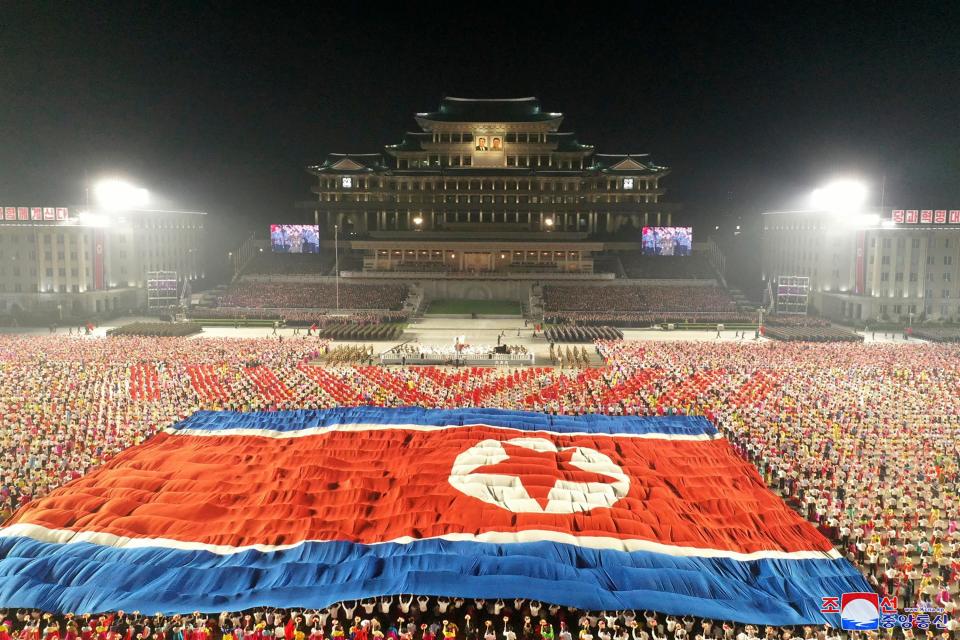 A huge North Korean flag is displayed at Kim Il Sung Square in Pyongyang.