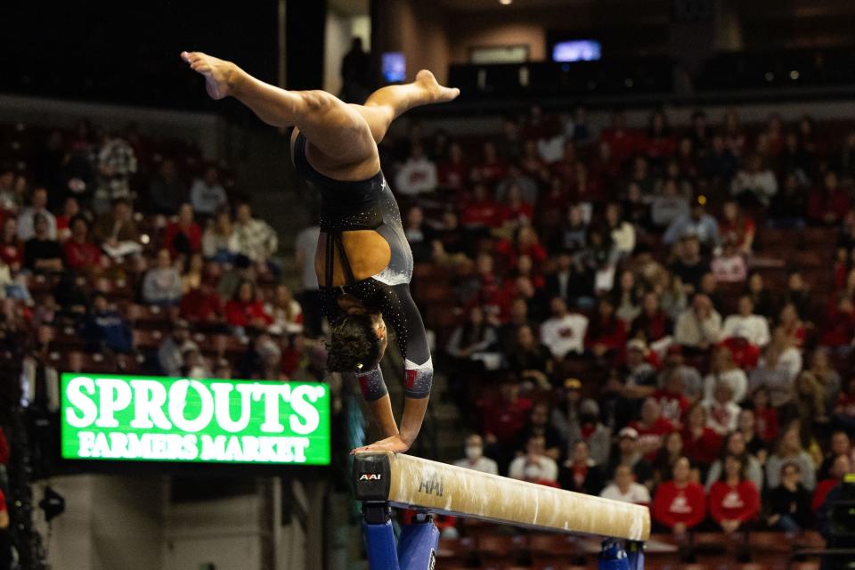 Utah Utes Amelie Morgan competes on bar during the Sprouts Farmers Market Collegiate Quads at Maverik Center in West Valley on Saturday, Jan. 13, 2024. #1 Oklahoma, #2 Utah, #5 LSU, and #12 UCLA competed in the meet. | Megan Nielsen, Deseret News