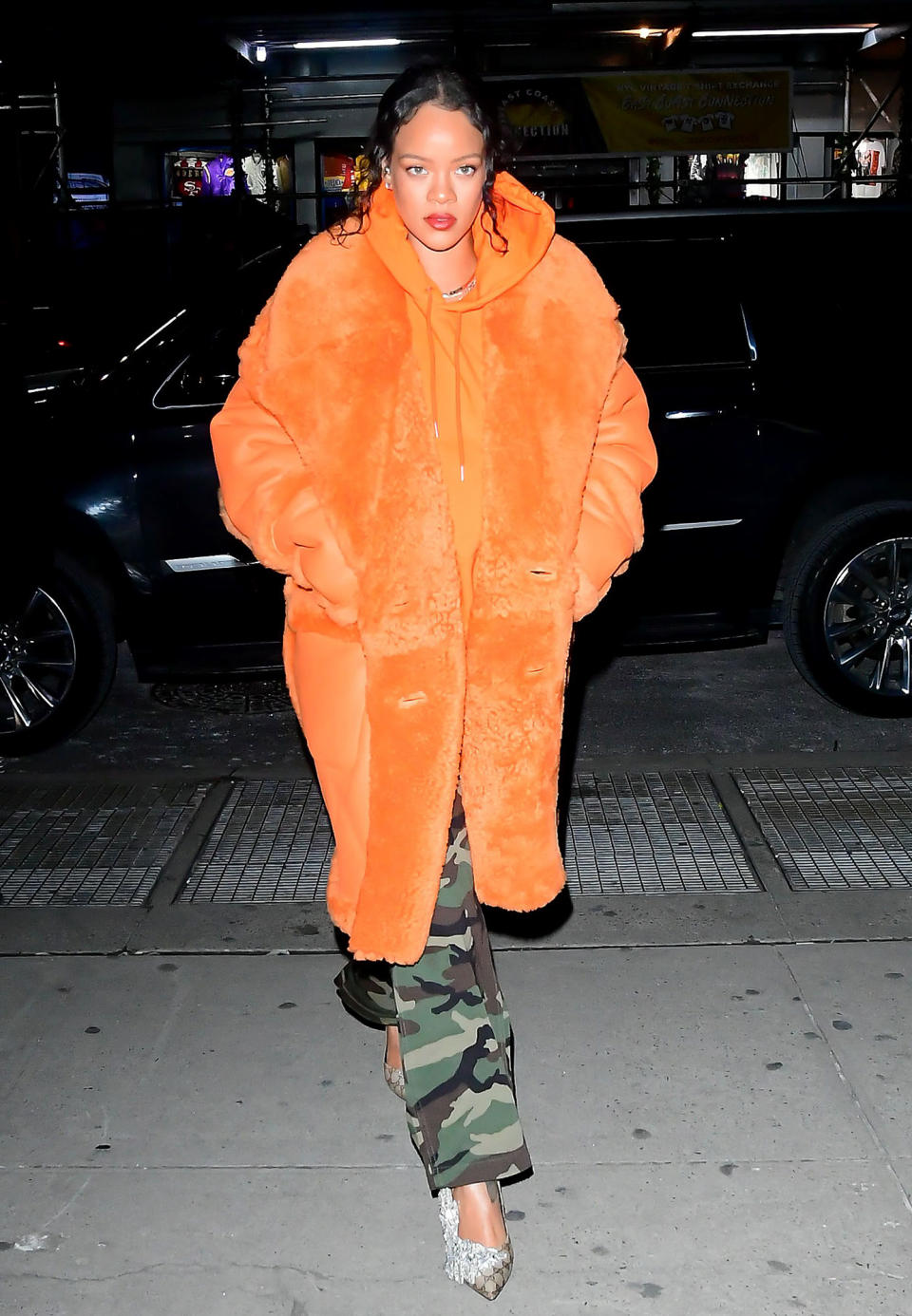 While Rihanna's pregnancy was under wraps at the time, she made a fashion-forward statement in a Jean Paul Gaultier orange coat.