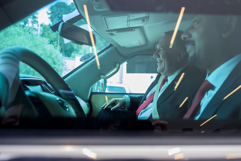 U.S. Secretary of State Mike Pompeo rides in a car with with Ethiopian Prime Minister Abiy Ahmed Ali after a meeting in Addis Ababa