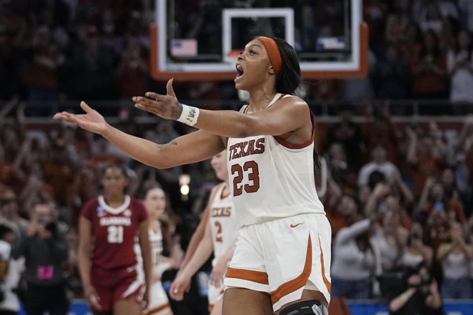 Texas forward Aaliyah Moore (23) celebrates after the team’s win over Alabama in a second-round college basketball game in the women’s NCAA Tournament in Austin, Texas, Sunday, March 24, 2024. (AP Photo/Eric Gay)