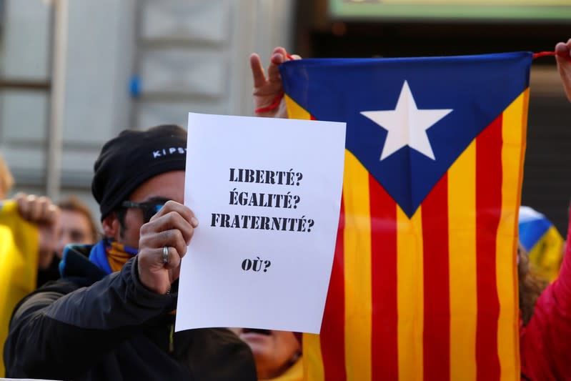 Catalan separatist demonstrators protest in front of the French consulate in Barcelona