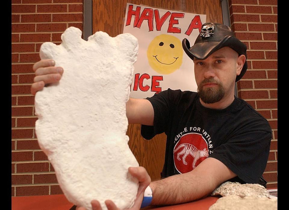 Ken Gerhard of Houston holds a duplicate plaster cast footprint at the Texas Bigfoot Conference in Jefferson, Texas, on Oct. 15, 2005. The event was hosted by the Texas Bigfoot Research Center.