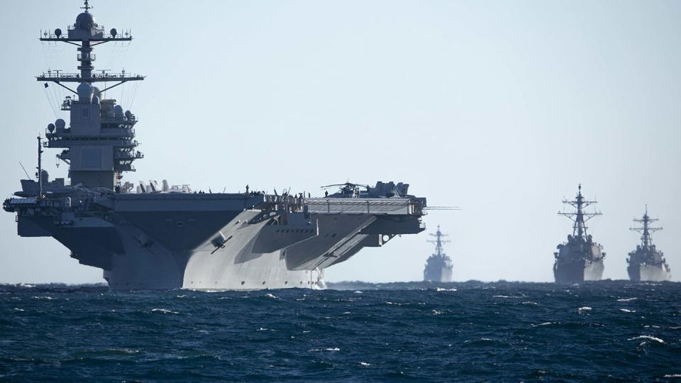 The aircraft carrier Gerald R. Ford and destroyers Thomas Hudner, Ramage and McFaul conduct a drill while underway in the Atlantic Ocean as part of the Gerald R. Ford Carrier Strike Group March 5. (MC2 Malachi Lakey/Navy)