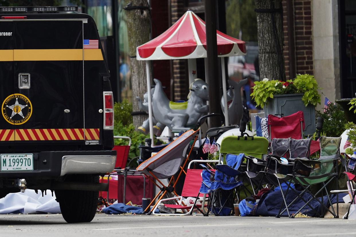 Empty chairs are seen on the street after a mass shooting at the Highland Park Fourth of July parade in downtown Highland Park, Ill., a Chicago suburb, on Monday, July 4, 2022.