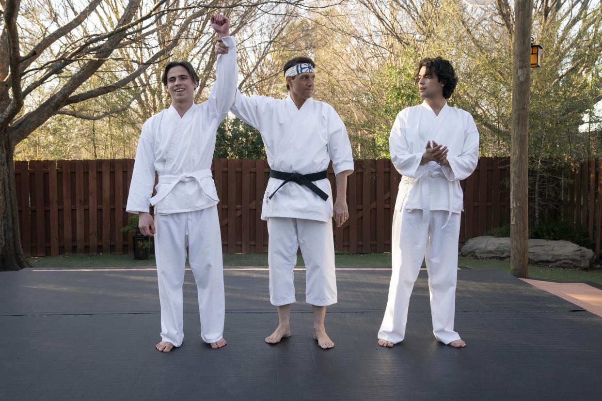 Tanner Buchanan, Ralph Macchio, and Xolo Maridueña in Cobra Kai, Season 6, Part 1<span class="copyright">Courtesy of Netflix</span>