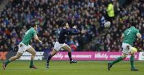 Britain Rugby Union - Scotland v Ireland - Six Nations Championship - BT Murrayfield Stadium, Edinburgh - 4/2/17 Greig Laidlaw of Scotland passes the ball along back line Reuters / Russell Cheyne Livepic