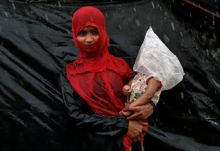 A Rohingya refugee waits in a camp in Cox's Bazar, Bangladesh, September 17, 2017. REUTERS/Cathal McNaughton
