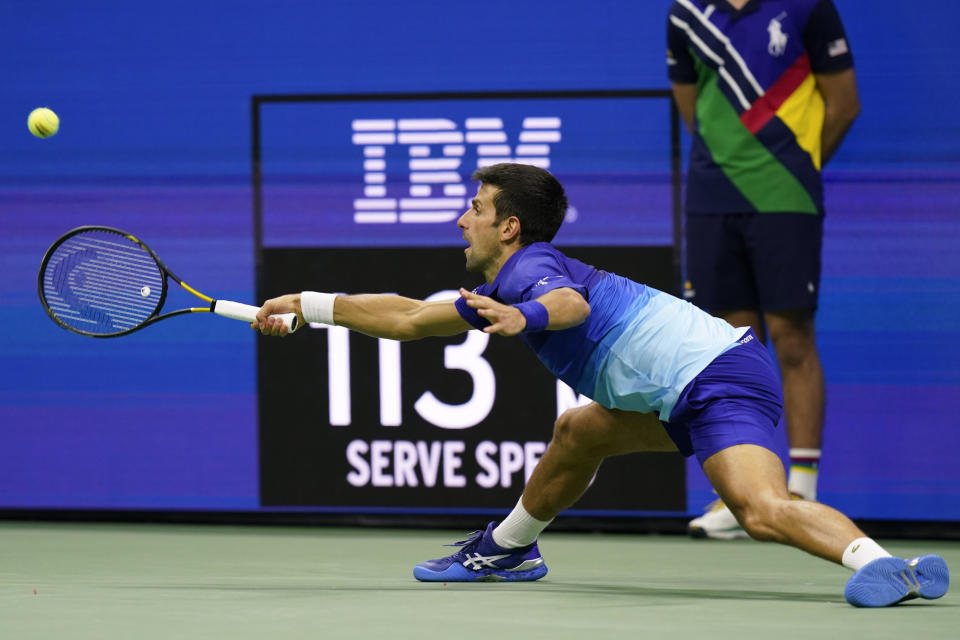 Novak Djokovic, of Serbia, returns a shot to Tallon Griekspoor, of the Netherlands, during the second round of the US Open tennis championships, Thursday, Sept. 2, 2021, in New York. (AP Photo/Frank Franklin II)