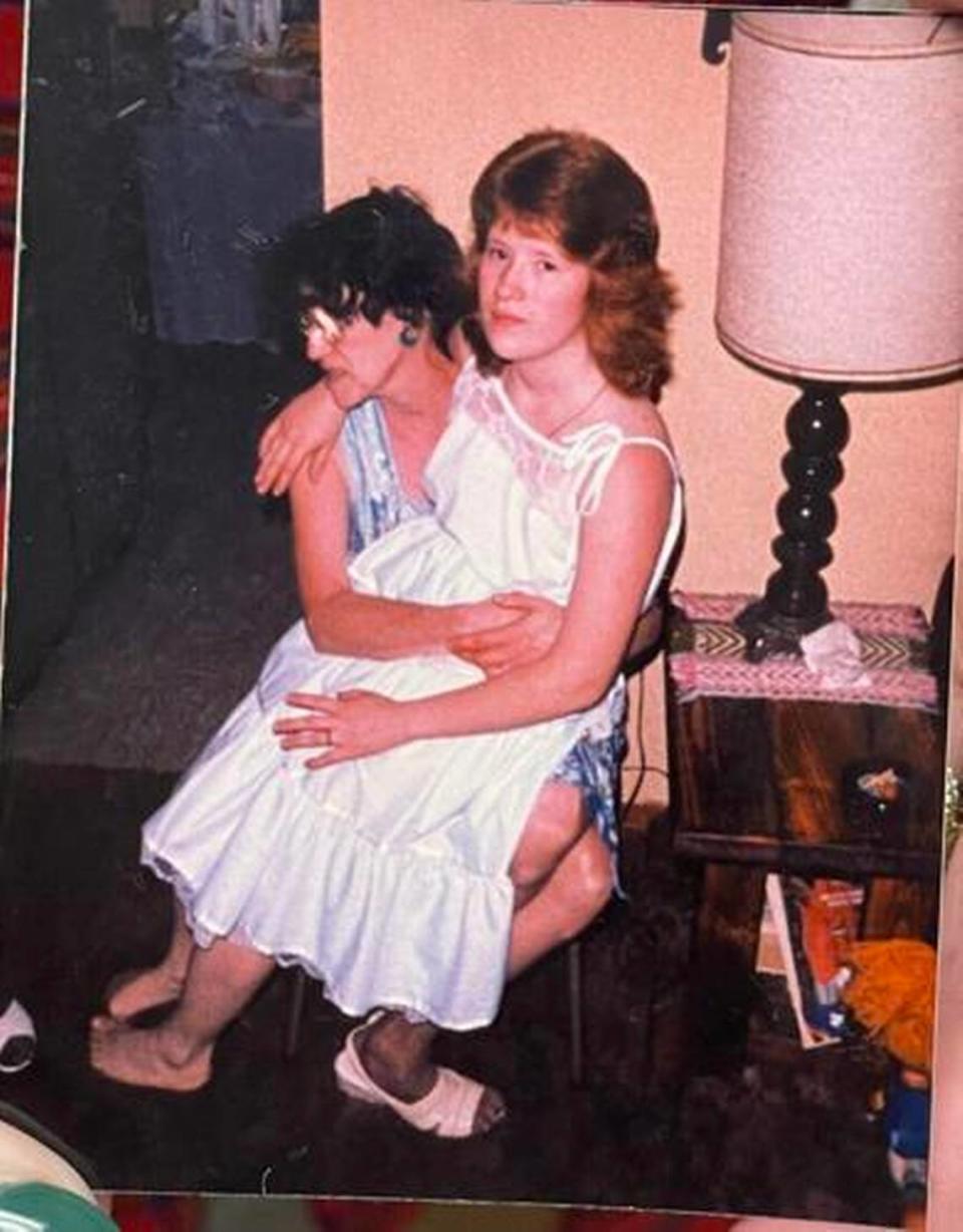 Susan Lund, in a white dress, is pictured with her mother.