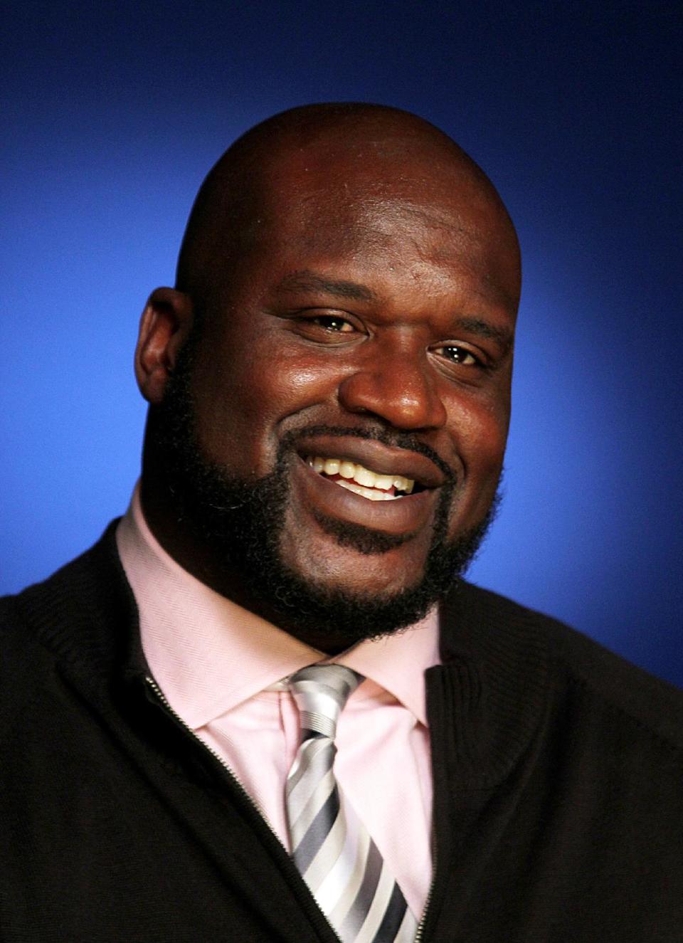 This Oct. 18, 2012 photo shows four-time NBA champion Shaquille O'Neal in New York. O'Neal is providing a forum for comics for his “All Star Comedy Jam" tour. The twenty-city tour includes urban comics Kevin Hart, Finesse Mitchell, and Gary Owen. The tour ends on New Year's Eve in Atlanta.(AP Photo/John Carucci)