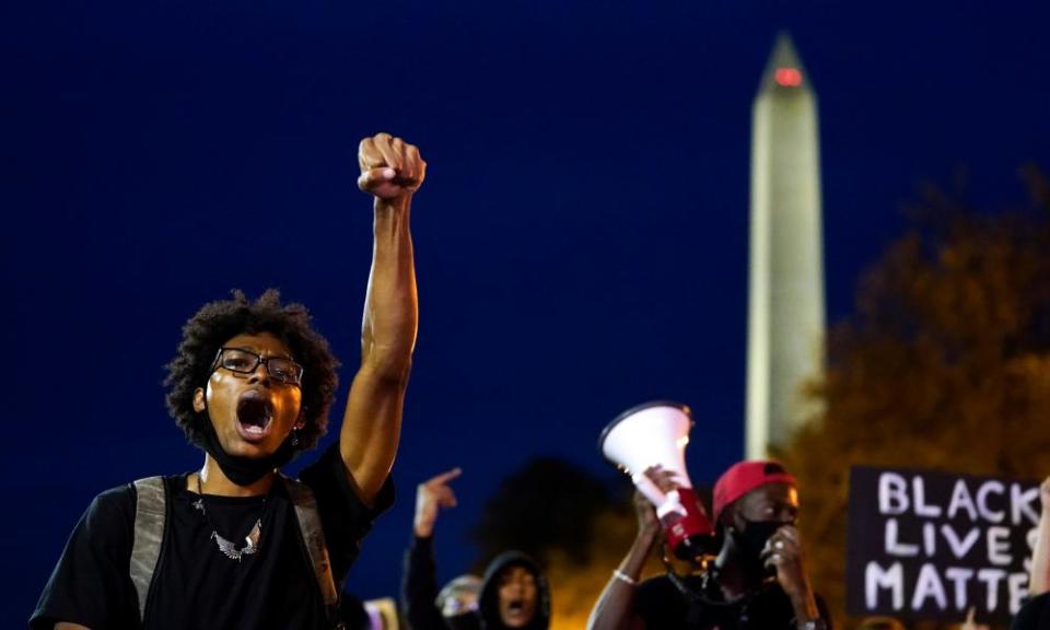 Protesters march near the White House in Washington DC.