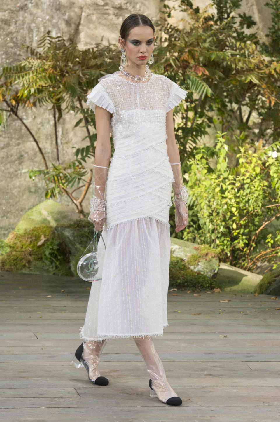 <p><i>Short-sleeve white crystal embellished dress from the SS18 Chanel collection. (Photo: ImaxTree) </i></p>