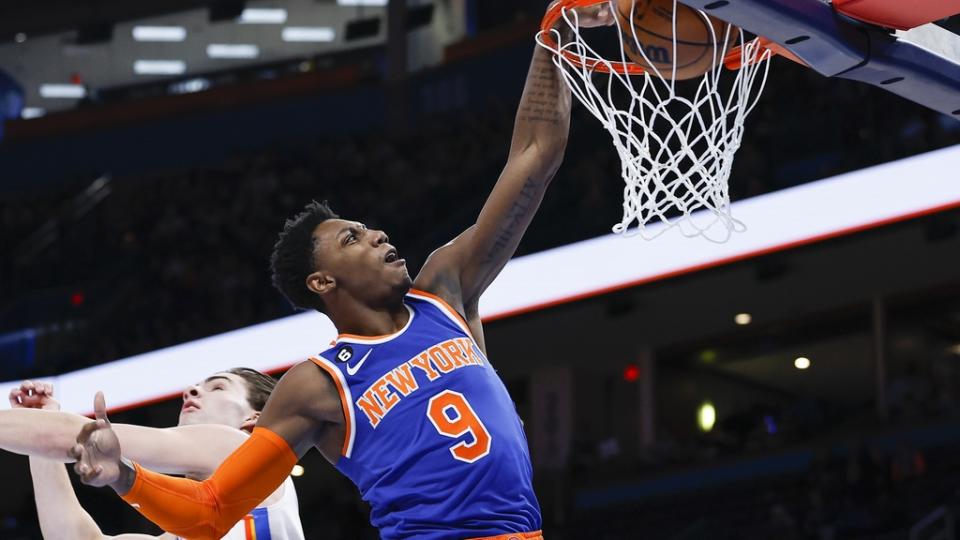 New York Knicks guard RJ Barrett (9) dunks ahead of Oklahoma City Thunder guard Josh Giddey (3) during the first quarter at Paycom Center.