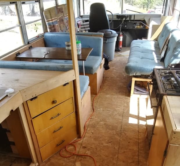 Verra used the couch and dinette from an old RV in the bus. She estimates she's spent a couple thousand dollars on wood, but most of the supplies have been donated.