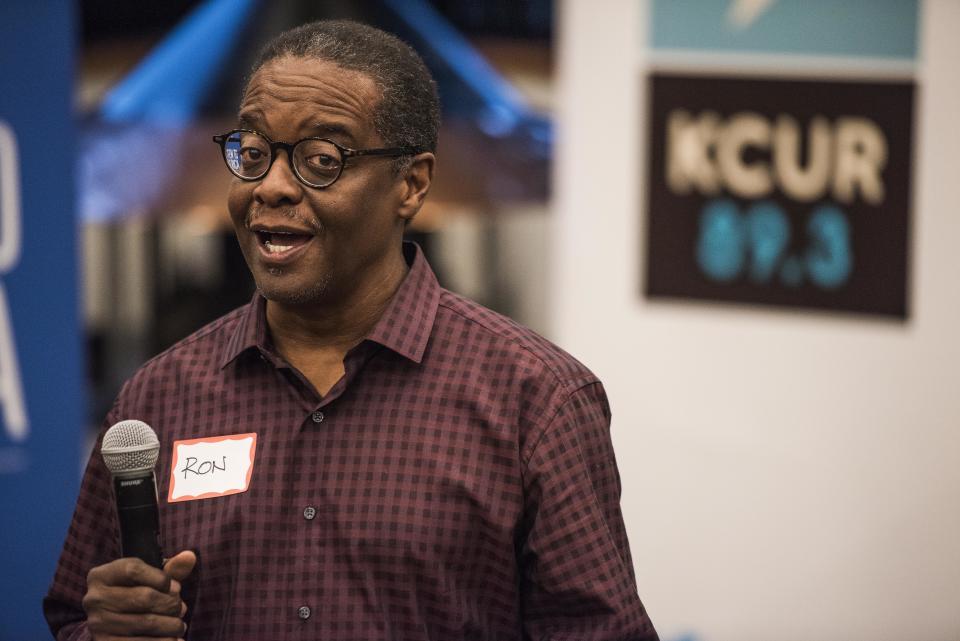 Ron Jones of KCUR speaks to the audience before the "Serving One's Country and Being True to Oneself" event.