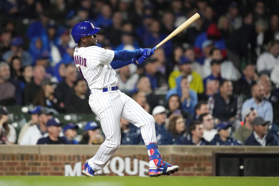 Chicago Cubs' Alexander Canario watches his RBI double off Pittsburgh Pirates relief pitcher Quinn Priester, his first hit in the majors, during the sixth inning of a baseball game Tuesday, Sept. 19, 2023, in Chicago. (AP Photo/Charles Rex Arbogast)