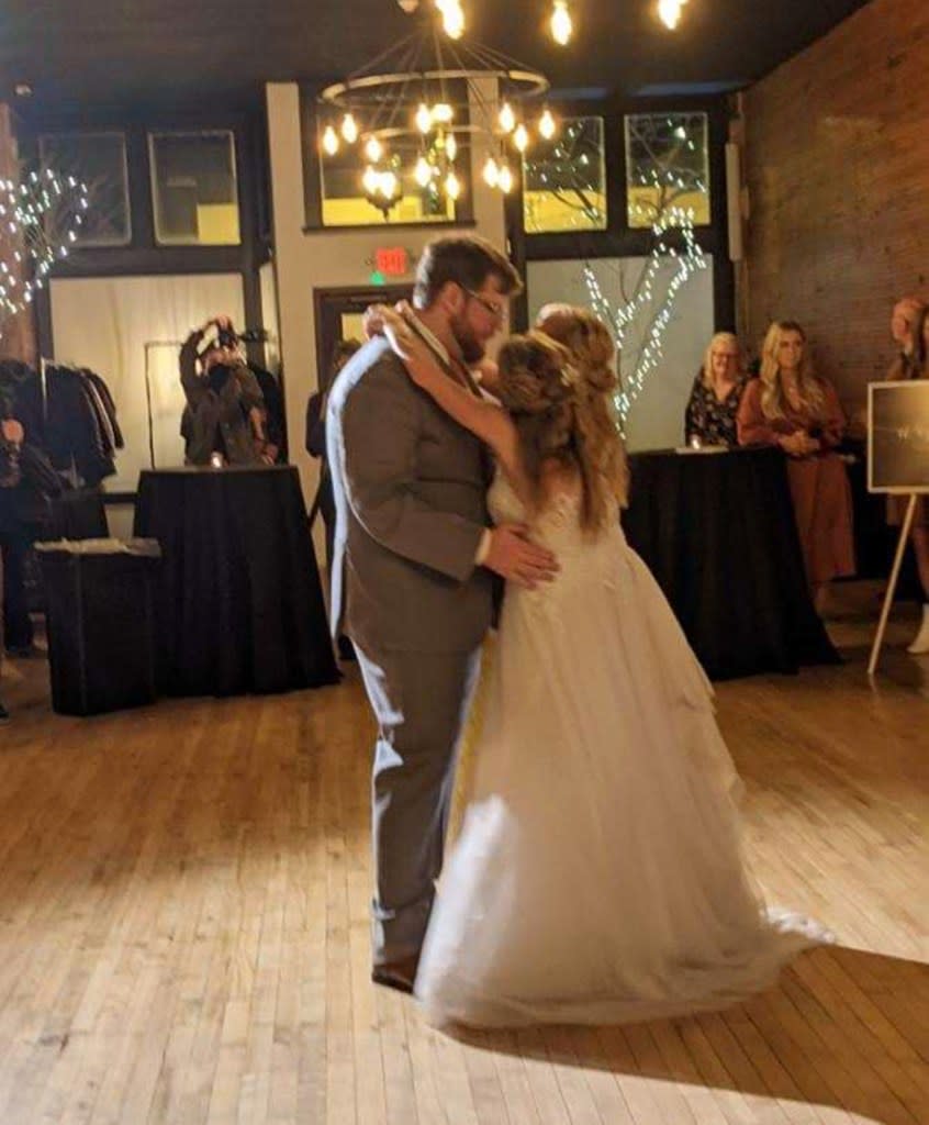 The blushing bride and her sister donned an all-white dress for the occasion while Bowling opted for a gray suit and orange tie. Heidi Bowling/ Facebook