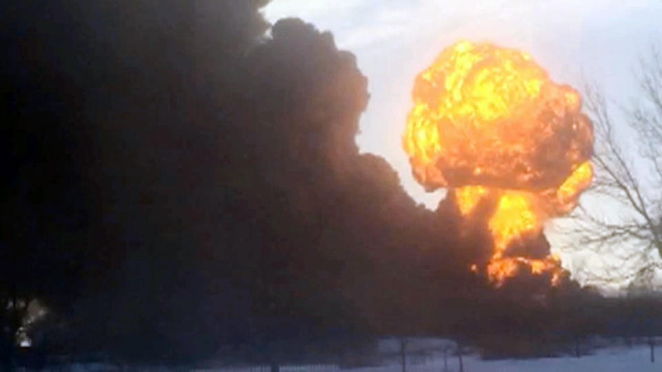 In this image made from a video provided by Darrin Rademacher, a fireball goes up at the site of an oil train derailment Monday, Dec 30, 2013, in Casselton, N.D. The train carrying crude oil derailed near Casselton Monday afternoon. Several explosions were reported as some cars on the mile-long train caught fire. (AP Photo/Darrin Rademacher)