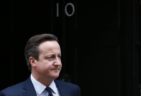 Britain's Prime Minister David Cameron waits to greet his Slovenian counterpart Miro Cerar at Number 10 Downing Street in London, Britain November 19, 2015. REUTERS/Stefan Wermuth