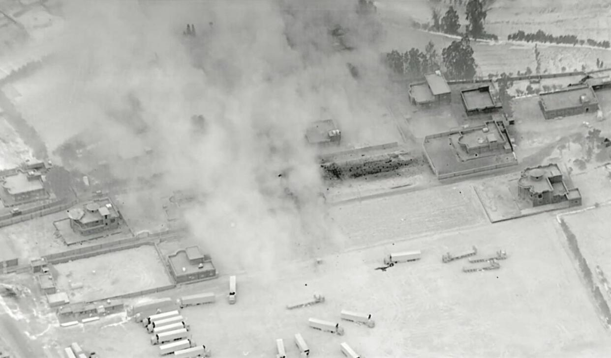 Smoke and dust rise after a U.S. airstrike on a   facility the Pentagon said was used by Iran-backed militia groups as a coordination center for the shipment and transfer of advanced conventional weapons near as-Sikak, along Iraq's western border with Syria, June   27, 2021, in an image taken from video provided by the U.S. military.  / Credit: U.S. Department of Defense/handout