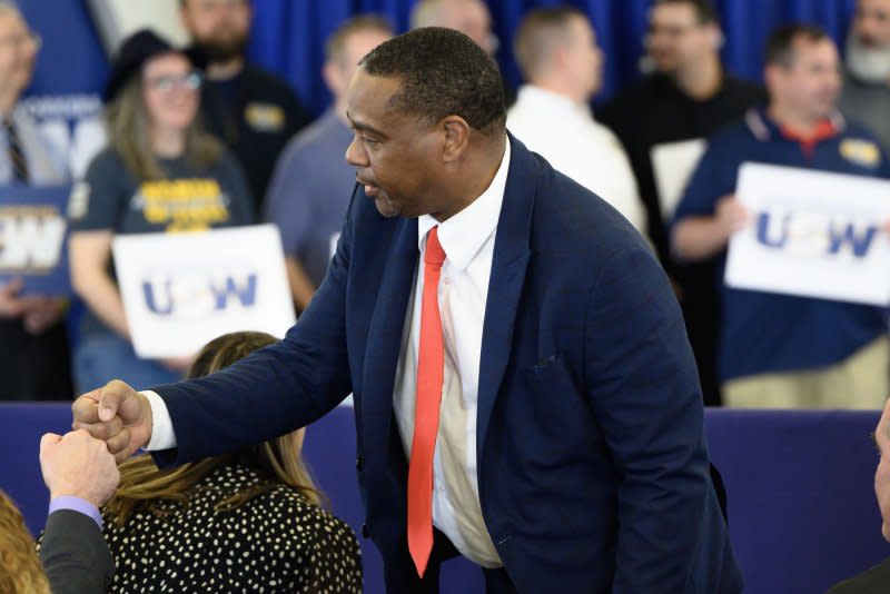 Mayor Ed Gainey greets members of the audience at the United Steel Workers Headquarters before the arrival of President Joe Biden in Pittsburgh, Pa., on Wednesday. Photo by Archie Carpenter/UPI