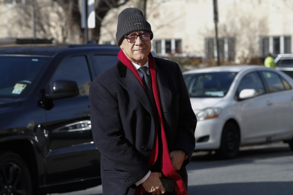 Bijan Kian, whose full name is Bijan Rafiekian, enters the FBI Washington Field Office in Washington, Monday, Dec. 17, 2018. Rafiekian, a one-time business partner of former National Security Adviser Michael Flynn, has been indicted on charges including failing to register as a foreign agent. According to the indictment, Rafiekian was vice-chairman of Flynn's business group, the Flynn Intel Group. The two worked to have cleric Fethullah Gulen extradited. (AP Photo/Jacquelyn Martin)