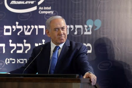 Israeli Prime Minister Benjamin Netanyahu speaks during a cornerstone-laying ceremony for Mobileye's center in Jerusalem