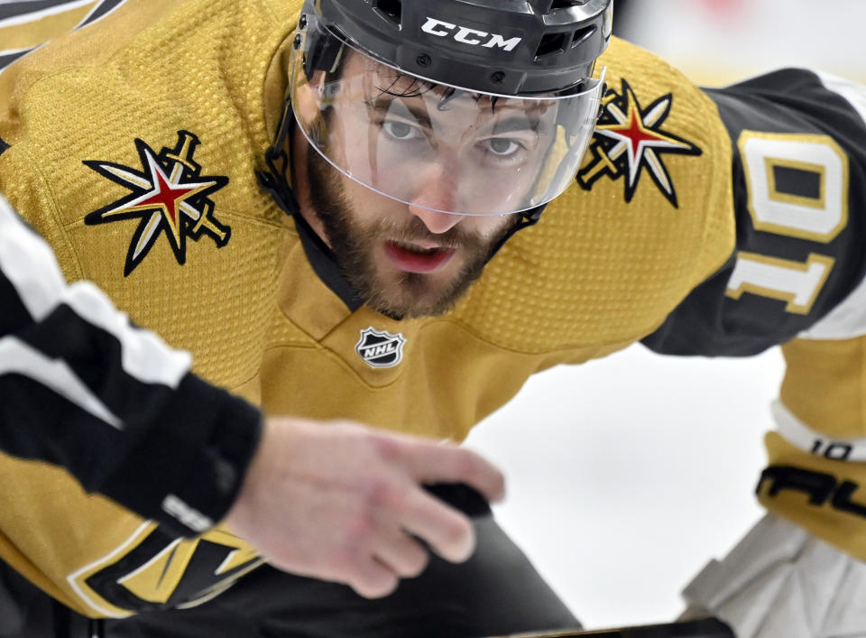 Vegas Golden Knights center Nicolas Roy eyes the puck before facing off against the Edmonton Oilers during the second period of an NHL hockey game Tuesday, Feb. 6, 2024, in Las Vegas. (AP Photo/David Becker)