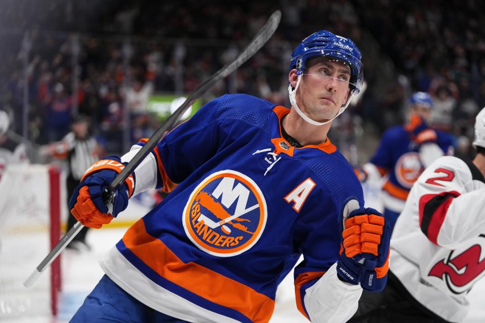 New York Islanders' Brock Nelson (29) celebrates after scoring a goal during the second period of an NHL hockey game against the New Jersey Devils, Friday, Oct. 20, 2023, in Elmont, N.Y. (AP Photo/Frank Franklin II)