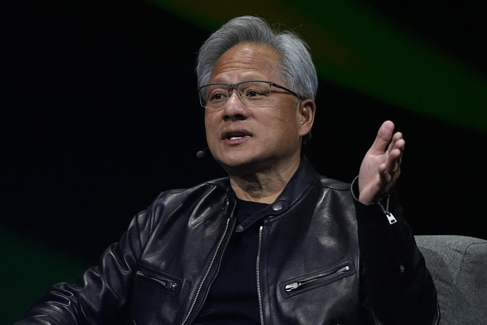 Jensen Huang, chief executive officer of Nvidia, makes a point as keynote speaker at SIGGRAPH 2024, the premier conference on computer graphics and interactive techniques, in the Colorado Convention Center Monday, July 29, 2024, in Denver. (AP Photo/David Zalubowski)