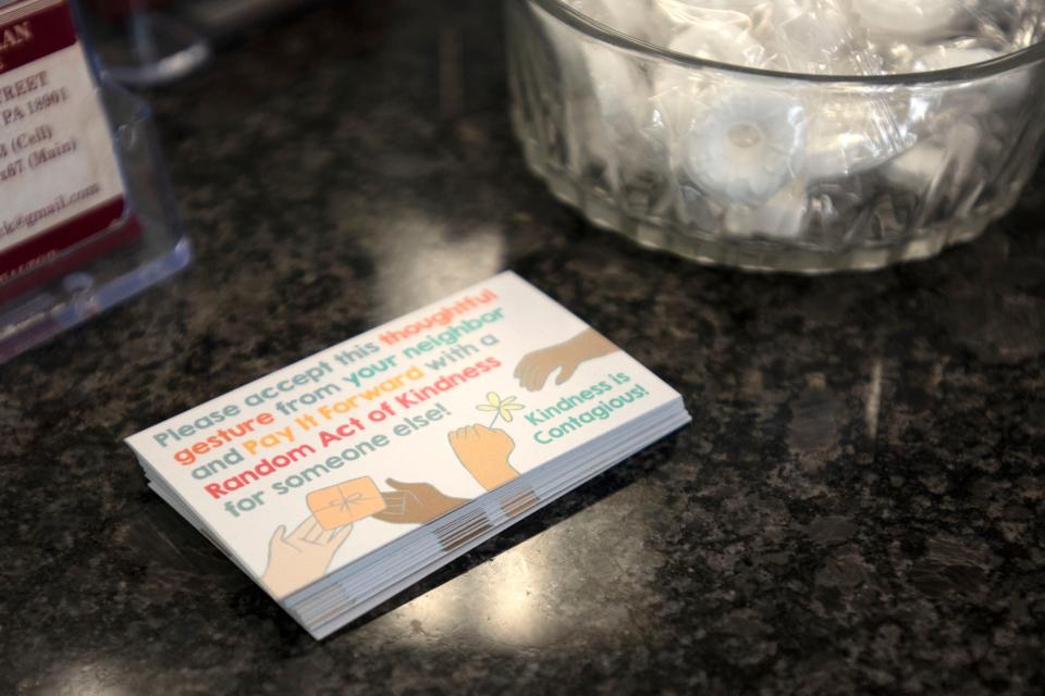 Kindness cards are placed on different businesses in Doylestown for guests to pick up, as seen on Tuesday, July 19, 2022.