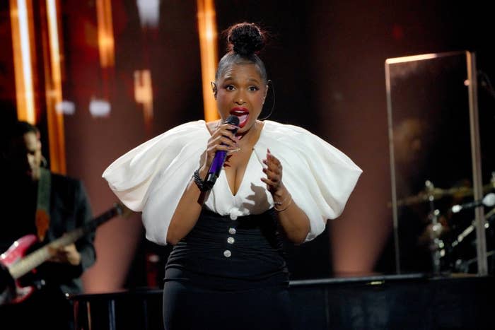 JHud singing onstage